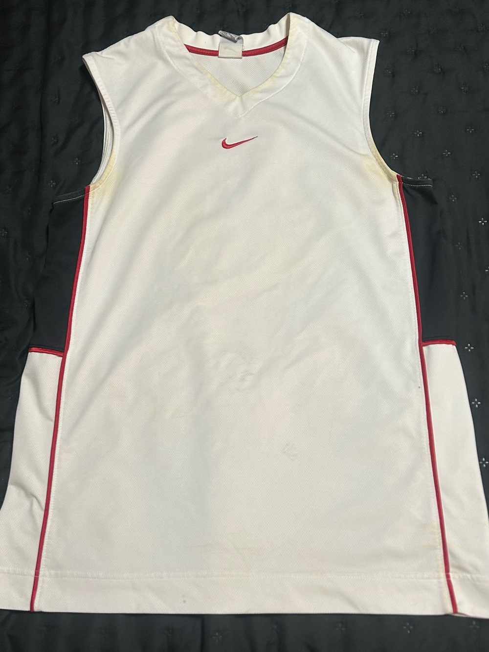 Nike White Basketball Jersey with Red Accents and Black Side Panels